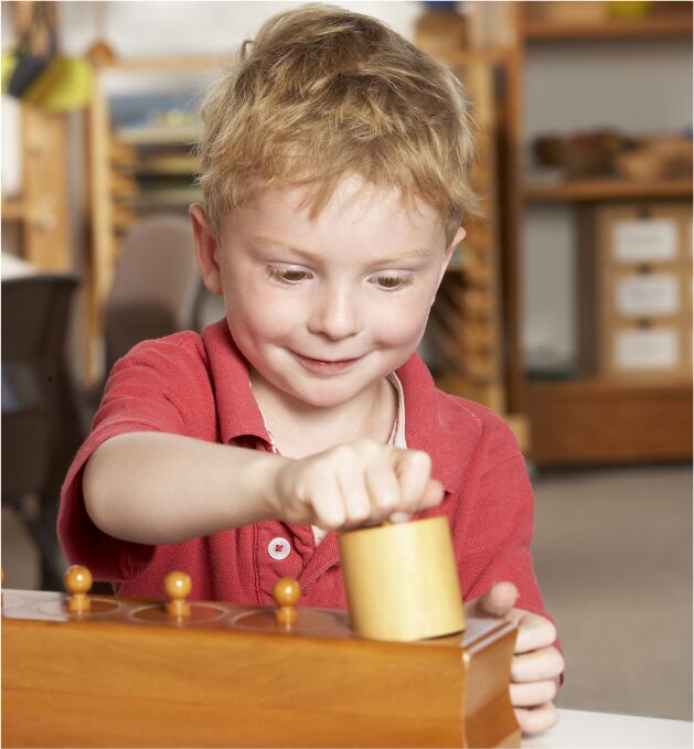 Child working with Montessori materials